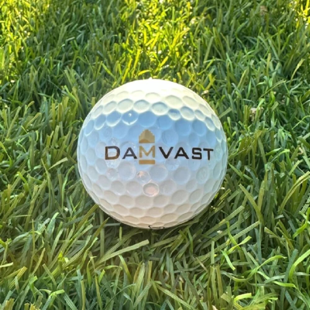 Printed golf ball with the DAMVAST logo